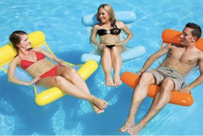 Inflatable floating bed