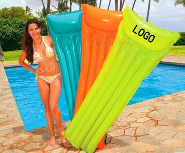 Inflatable floating bed